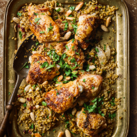 Baharat roast chicken with barberry freekeh & fried almonds